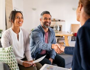 Couple meeting with their estate planning attorney.